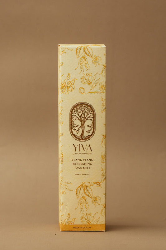 YIVA face mist packaging on a brown background