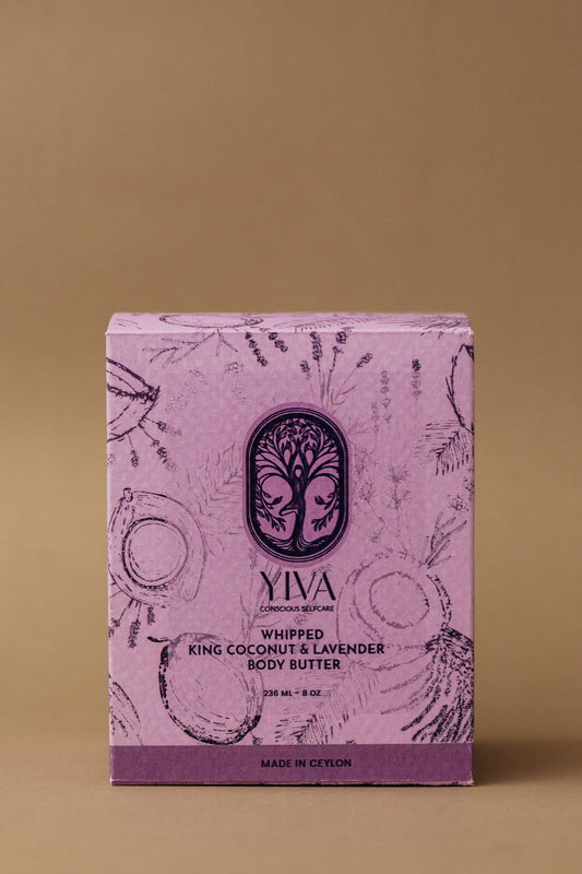 Pink packaging of YIVA body butter on a brown background