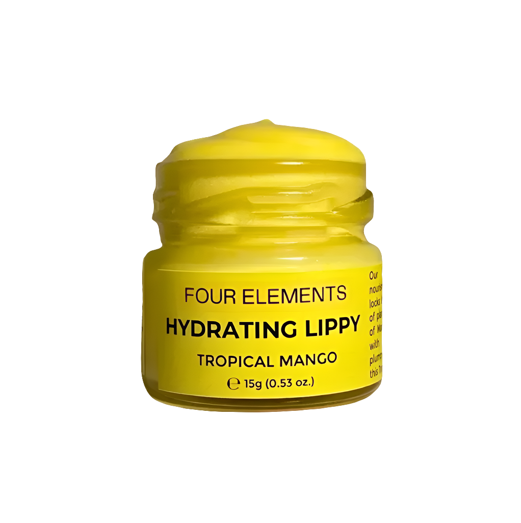 A yellow jar of Four Elements Hydrating Lip Butter with the label Tropical Mango visible on the lid.