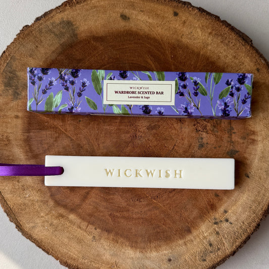 Wickwish scented bar and packaging on a wooden surface