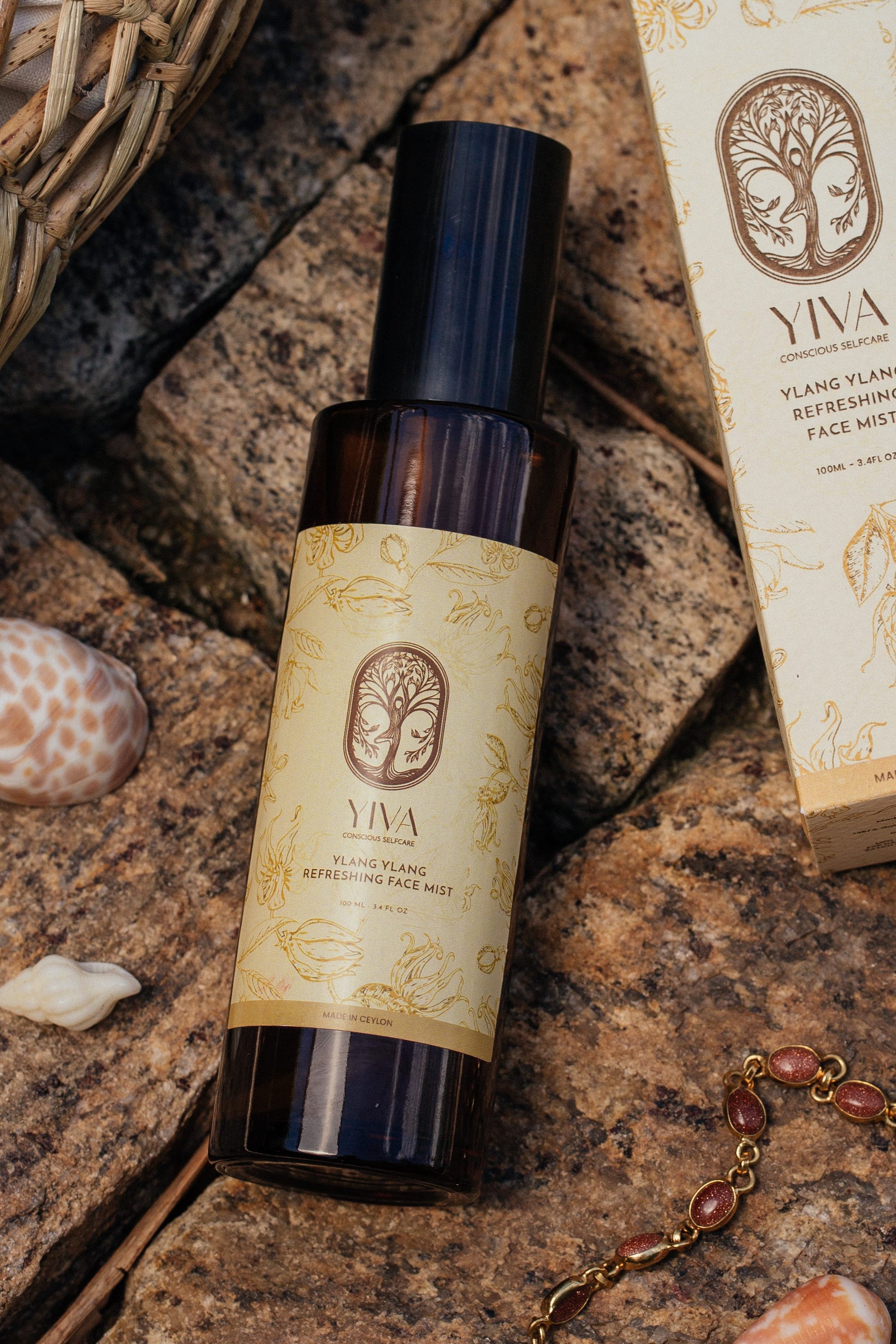 Yiva skincare product on a stone surface with packaging in the background